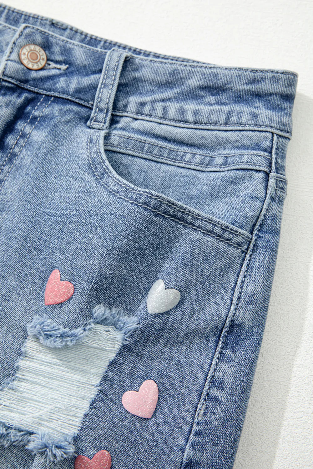 Distressed Heart-Shaped Mini Denim Skirt with Raw Hem